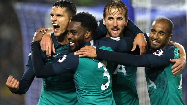 Erik Lamela celebrates with teammates Danny Rose, Harry Kane and Lucas Moura