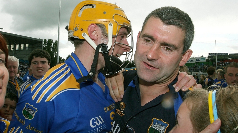 Shane McGrath and Liam Sheedy after Tipp's Munster triumph in 2009