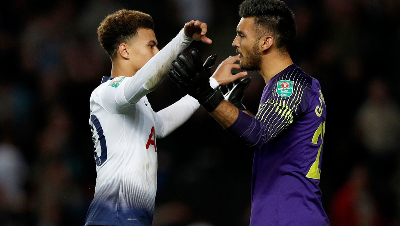 Dele Alli and Paulo Gazzaniga celebrate the penalty shootout win