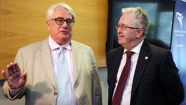 Chief Justice Frank Clarke (L) said it was necessary to cancel the meeting with Judge Seamus Woulfe after he received a 'cogent medical report'