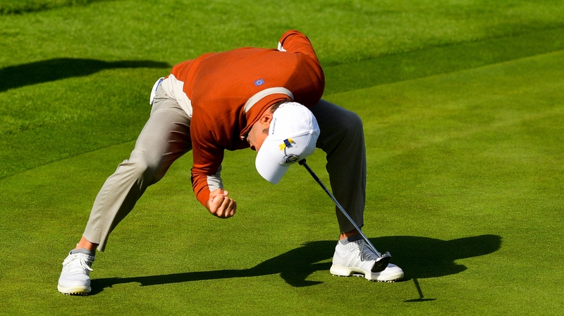 Sergio García of Europe celebrates his putt on the 17th