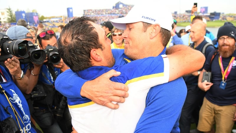 Francesco Molinari celebrates after moving Europe to 14.5 points