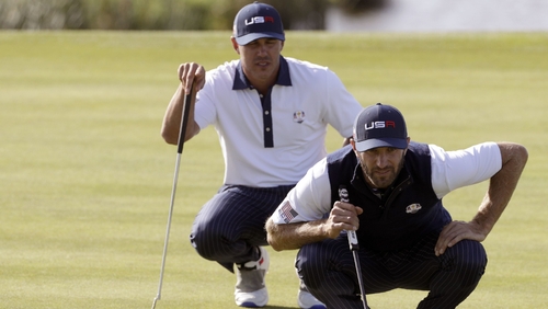 Brooks Koepka and Dustin Johnson in action during the Ryder Cup