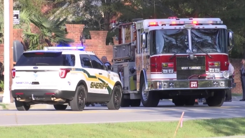 A two-hour standoff outside a house in Florence ended with the suspect's arrest