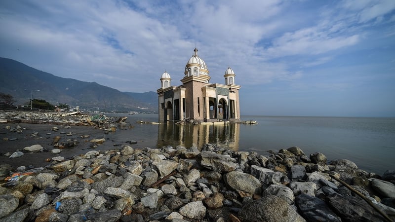 A mosque still standing amid the disaster