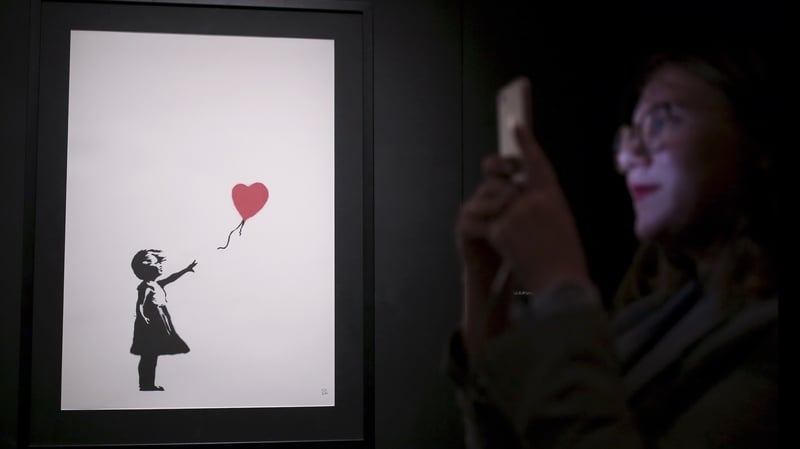 'Girl With Balloon' went under the hammer for £1m