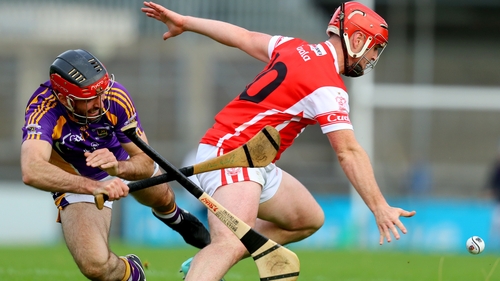 David Treacy battles with Damien Kelly in the Dublin hurling semi-final