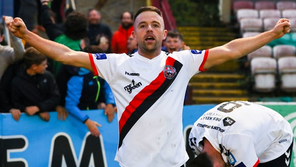 Keith Ward celebrates Dinny Corcoran scoring a goal