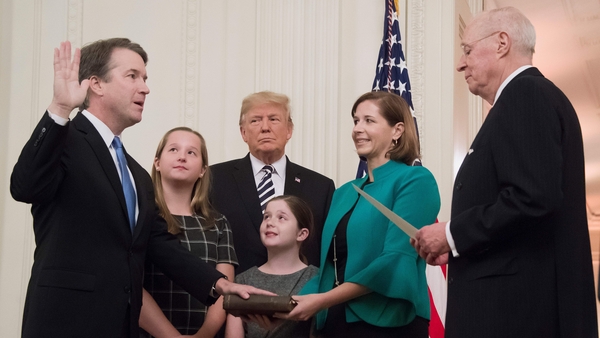 Brett Kavanaugh is sworn-in as Associate Justice of the US Supreme Court with his family by his side