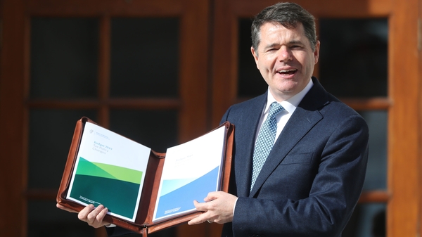 Minister for Finance Paschal Donohoe with the Budget document this afternoon