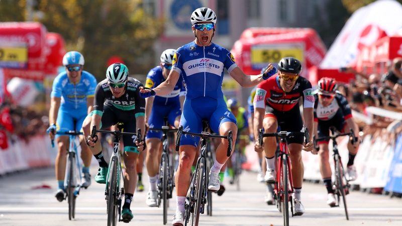 Ariel Maximiliano Richeze (C) celebrates victory ahead of Sam Bennett of Ireland (L) and Jean Pierre Drucker (R) of Luxembourg
