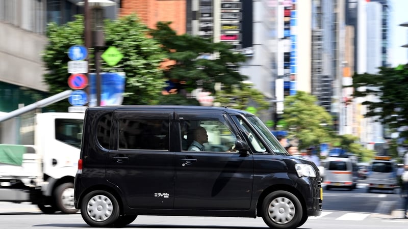 One of Honda's Kei cars on a Tokyo street.