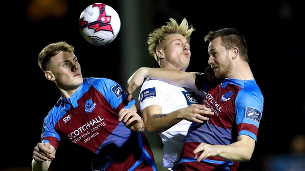 Drogheda's Ciarán Kelly and Luke Gallagher rise with Jesse Devers of Finn Harps