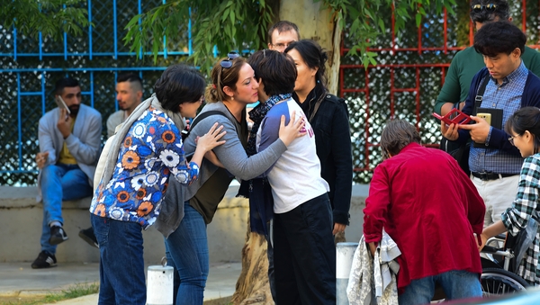 Supporters of the American pastor Andrew Brunson hug each other after his release