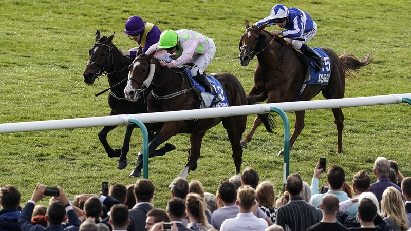 Seamie Heffernan riding Low Sun (pink, green cap) wins the Cesarewitch Stakes at Newmarket