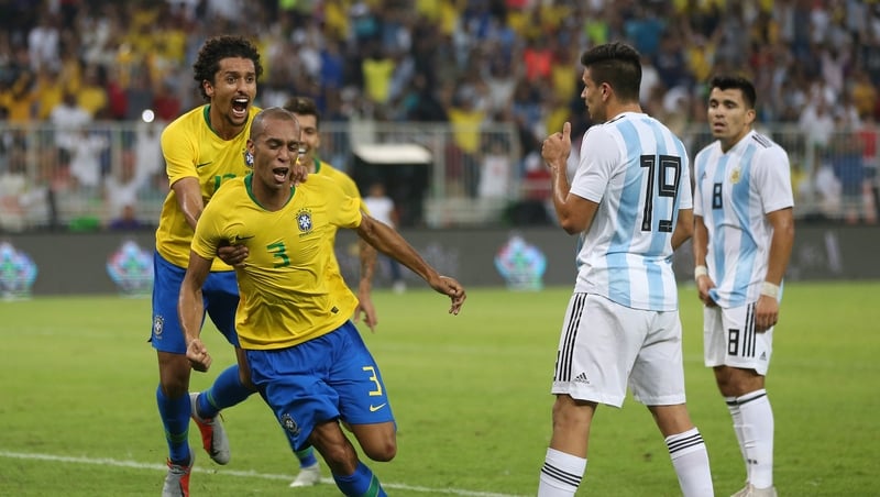 Miranda (l) celebrates his goal