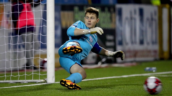 Sligo goalkeeper Ed McGinty is beaten by the penalty of Patrick Hoban