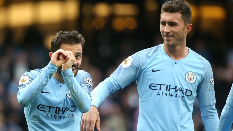 Bernardo Silva (L) of Manchester City celebrates after scoring his team's second goal