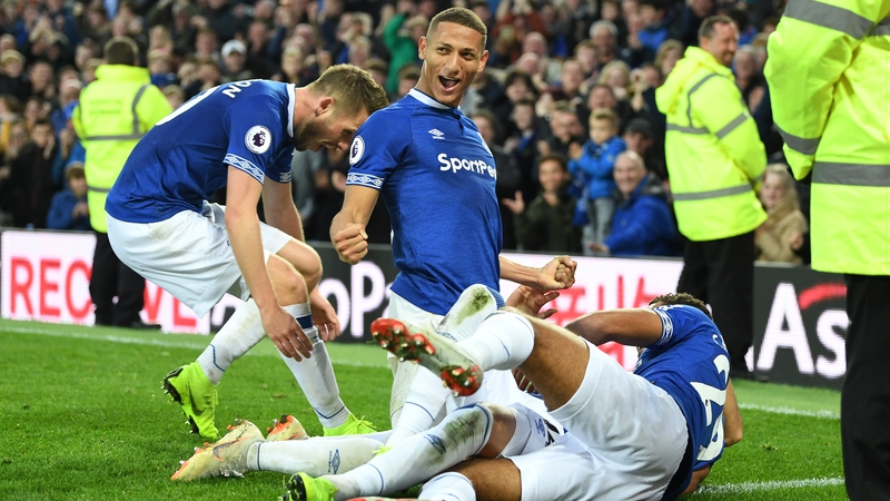 Cenk Tosun of Everton celebrates after scoring his side's second goal