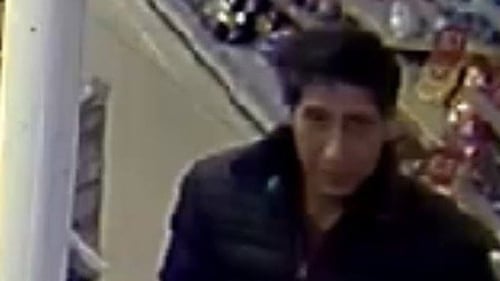 The suspect was pictured leaving a restaurant in Blackpool carrying what appeared to be a crate of cans (Photo: Blackpool Police Facebook)