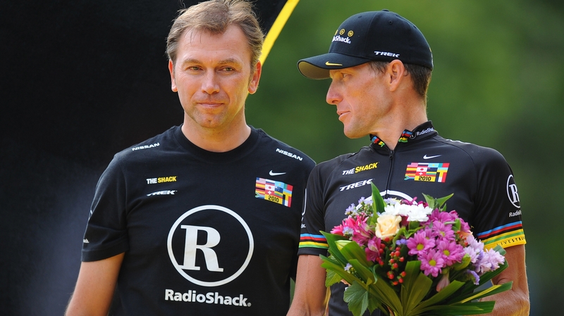 Johan Bruyneel and Lance Armstrong (R) at the Tour de France in 2010