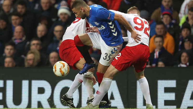Eros Grezda of Rangers vies with Nikolai Rasskazov of Spartak Moscow