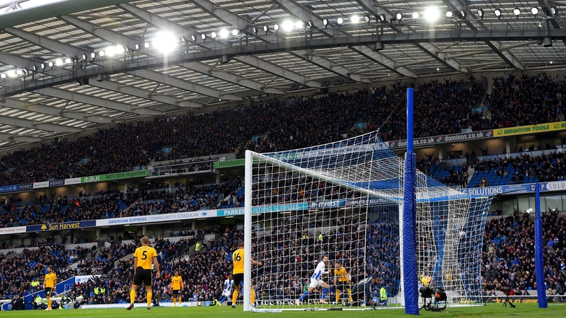 Murray heads Brighton into the lead