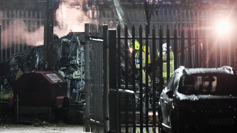 Emergency services work at the scene on the wreckage of a helicopter that crashed in a car park outside the King Power Stadium