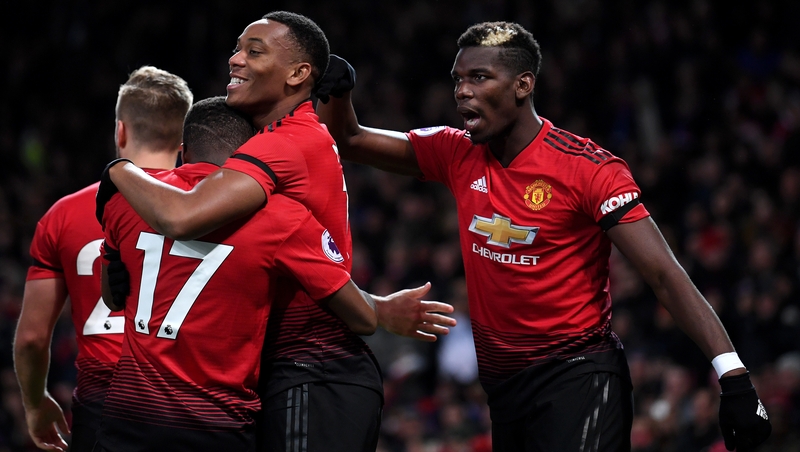 Anthony Martial is mobbed after his goal for Manchester United