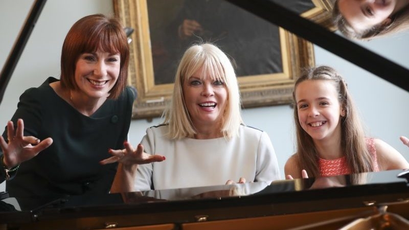 Minister for Culture, Heritage & the Gaeltacht, Josepha Madigan and Minister of State for Higher Education, Mary Mitchell O'Connor, with RIAM student Charlotte Croke