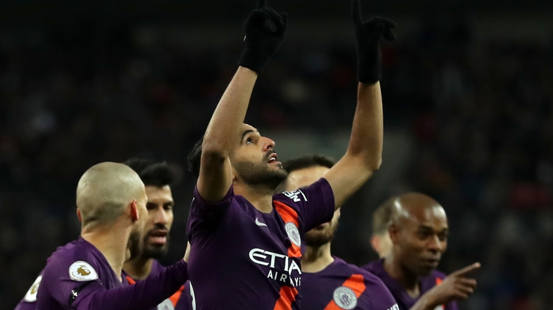 Riyad Mahrez celebrates after scoring