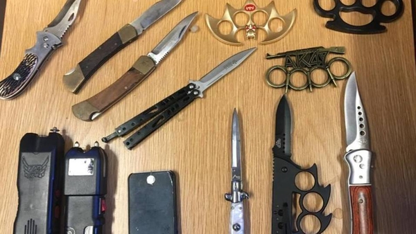 The haul of tasers, flick knives and knuckledusters