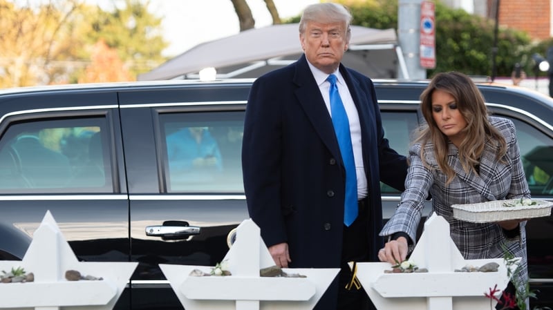 US President Donald Trump and Melania Trump at a memorial to the victims in Pittsburgh