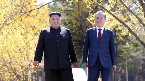 North Korean leader Kim Jong-un with South Korean President Moon Jae-in at their third summit in Pyongyang in September