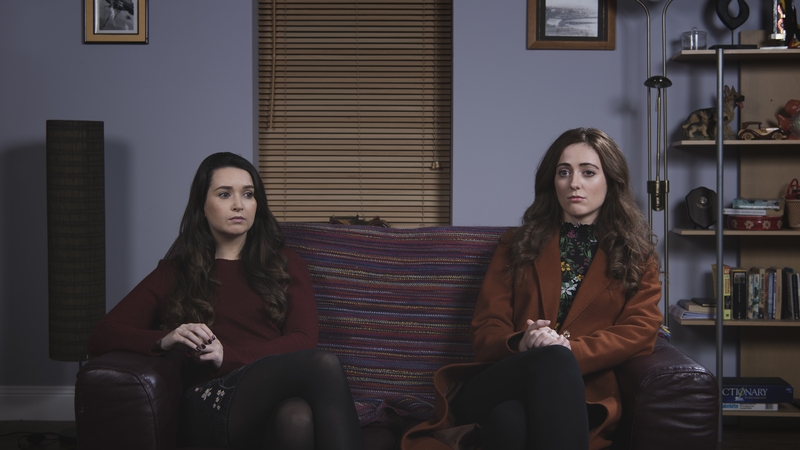 Opposite ends of the couch: Katy and Dee