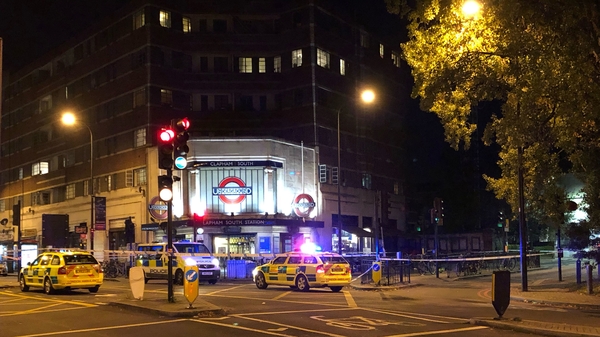Police outside Clapham South tube station after a 17-year-old boy was fatally stabbed