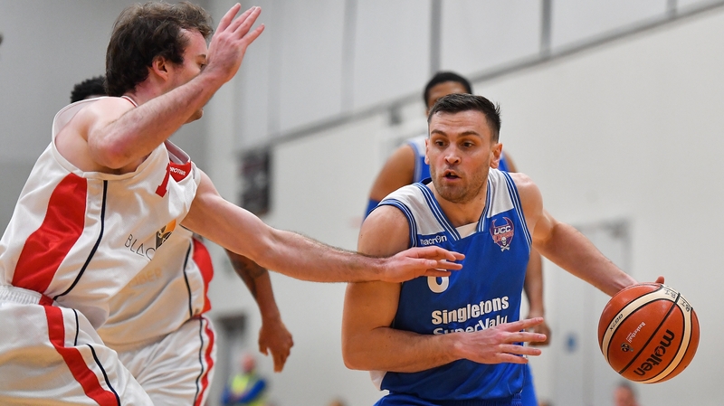 Kyle Hosford (R) in action for UCC Demons against Templeogue