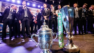 Dundalk players with the FAI and Premier Division trophies