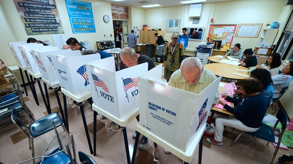 People cast their ballots at a school in Los Angeles, California