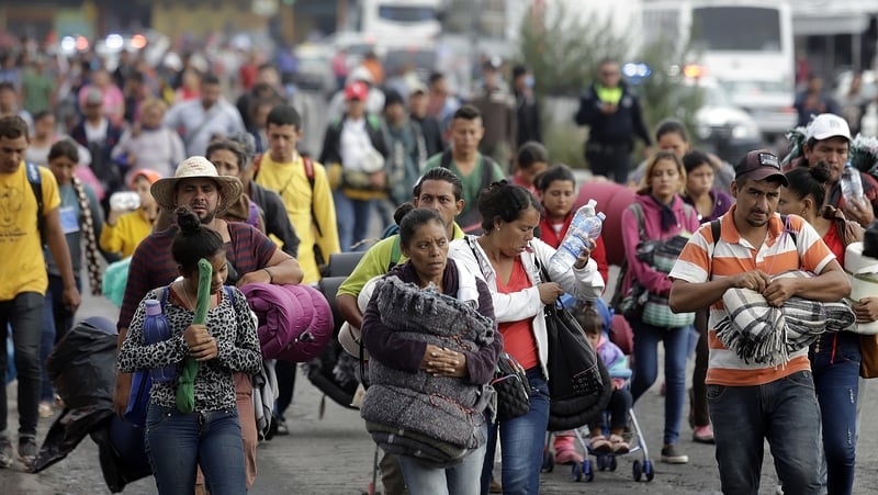 Thousands of people are attempting to walk to the US border