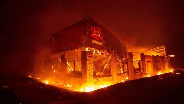 The flames have been driven by strong winds and dry conditions