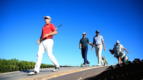 Zach Johnson, Billy Horschel, and Matt Kuchar walk off the 17th