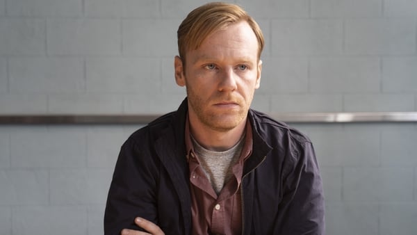 Wayne is evasive as he is questioned by Detective Jen Rooney in Taken Down