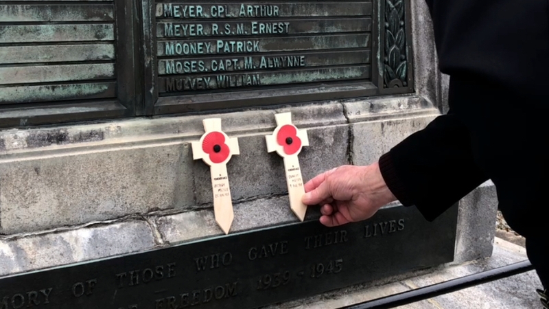 Brian Meyer leaves memorials for his two relatives who died during the war at a WWI memorial in Bray, Co Wicklow