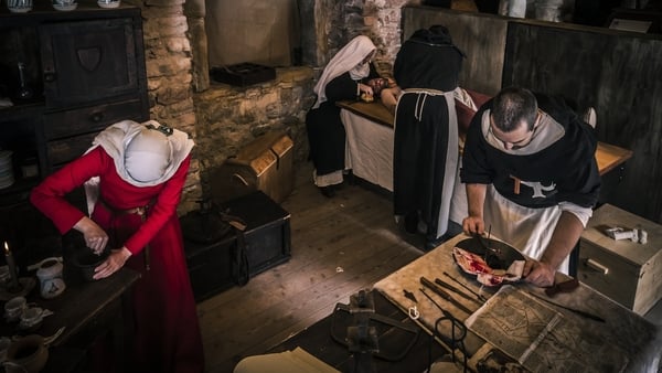 Historical re-enactment of a surgeon operating on an archer who was wounded during an attack by the Mamluks on the monastery of the Order of the Hospitallers (1250-1291) in Acre in Israel. Photo: DeAgostini/ Getty Images