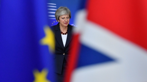 UK and European businesses give wary welcome to Theresa May's draft Brexit deal