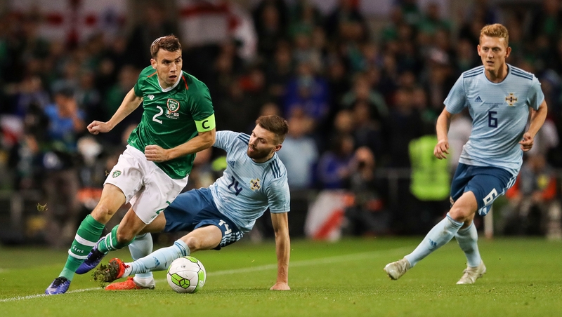 Ireland's Seamus Coleman with Stuart Dallas of Northern Ireland in the Three International Friendly at the Aviva Stadium, Dublin in November 2018. Photo: INPHO/Ryan Byrne