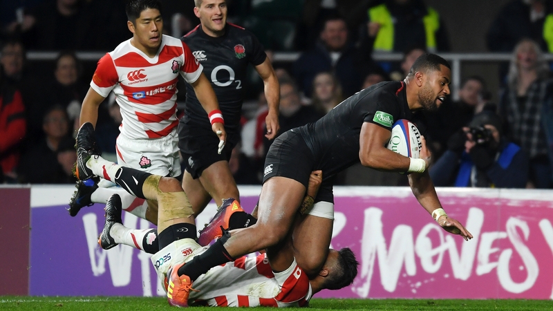 Joe Cokanasiga of England breaks through to score a try