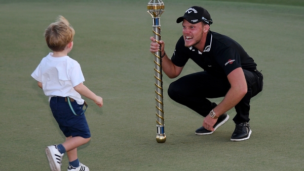 Danny Willett celebrates with his son