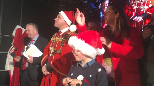 CervicalCheck campaigner Vicky Phelan, along with members of her family, switched on the lights